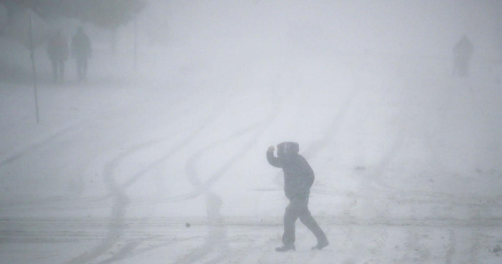 A man  in a blizzard