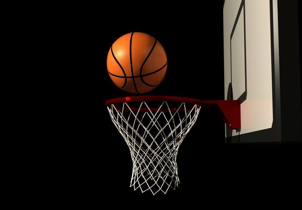 An image of a basketball going into a hoop
